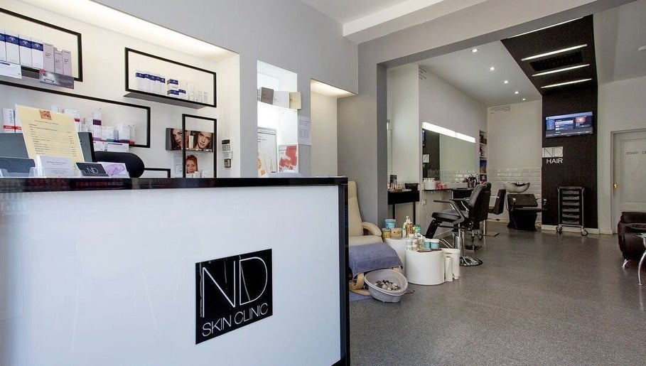 Interior view of ND Skin Clinic, Prestwich, England, featuring reception and product displays.
