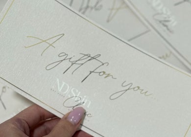 ND Skin Clinic gift certificate held by a hand in Prestwich, England, GB.