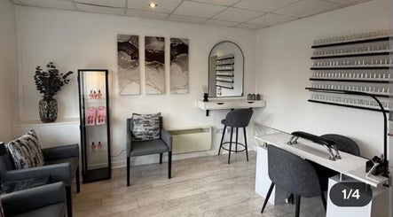 Elegant interior of SummerLily Nails, Rainhill, England, GB, featuring modern decor and nail polish displays.