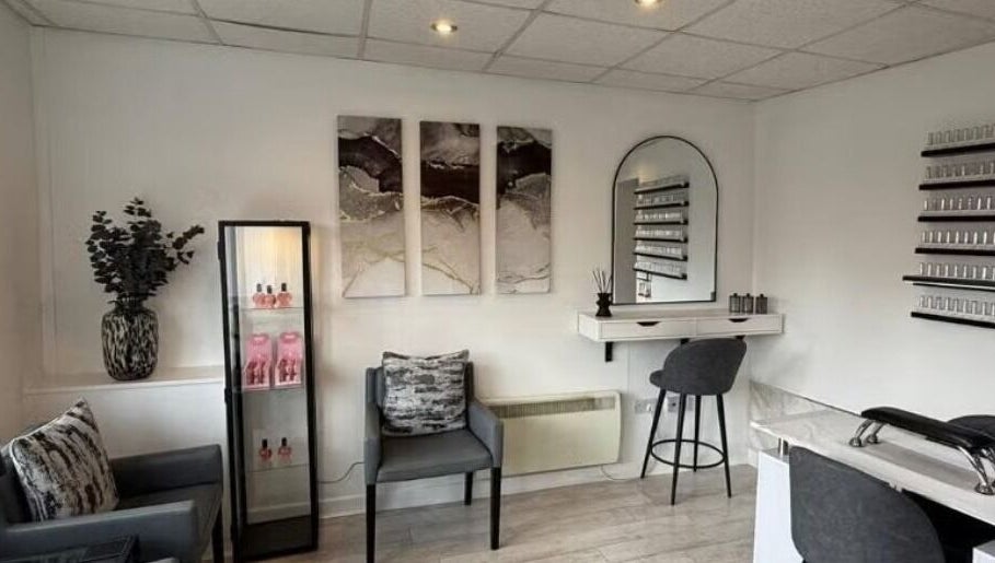 Elegant and modern interior of SummerLily Nails in Rainhill, England, GB, featuring chic decor and cozy seating.