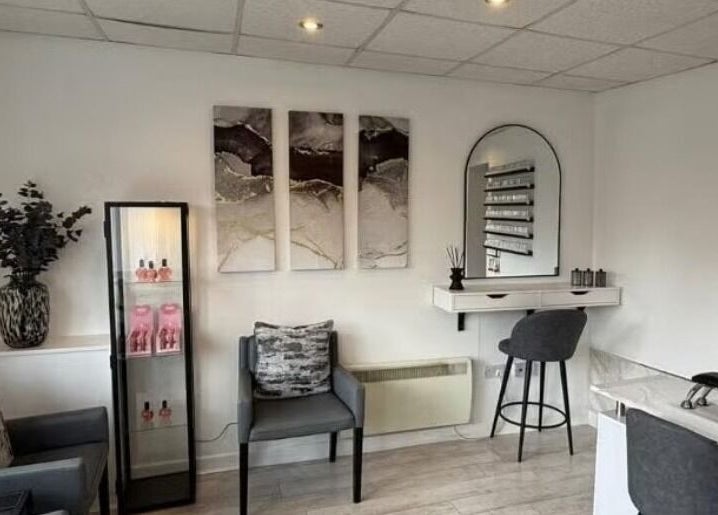 Elegant and modern interior of SummerLily Nails in Rainhill, England, GB, featuring chic decor and cozy seating.