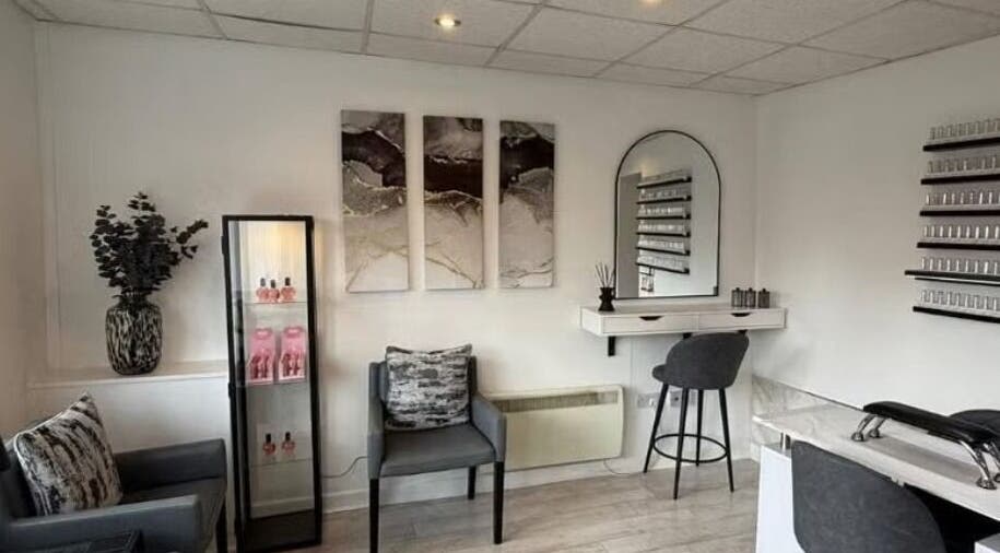 Elegant and modern interior of SummerLily Nails in Rainhill, England, GB, featuring chic decor and cozy seating.
