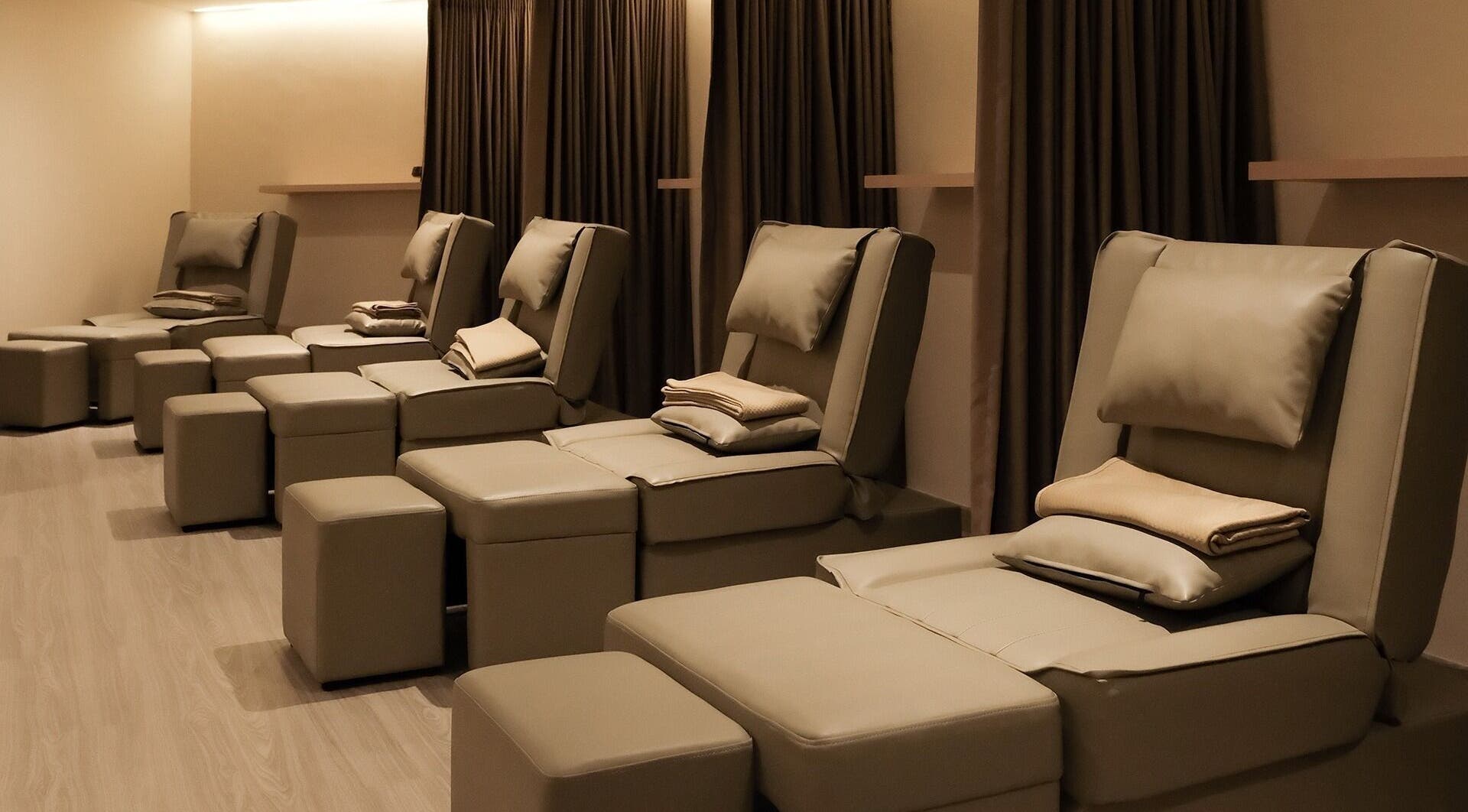 Comfortable massage chairs at Kama Spa, Daerah Khusus Ibukota Jakarta, aiding relaxation and wellness.
