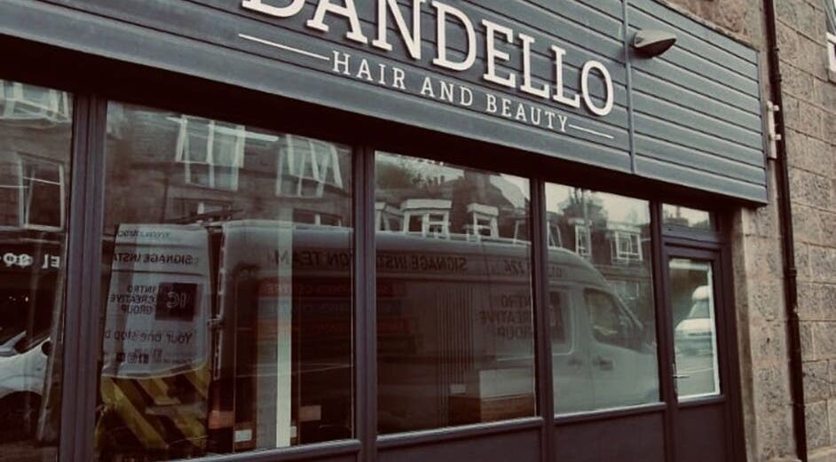 Nailsbyjessie venue exterior in Aberdeen, Scotland, GB with modern glass windows and stylish signage.