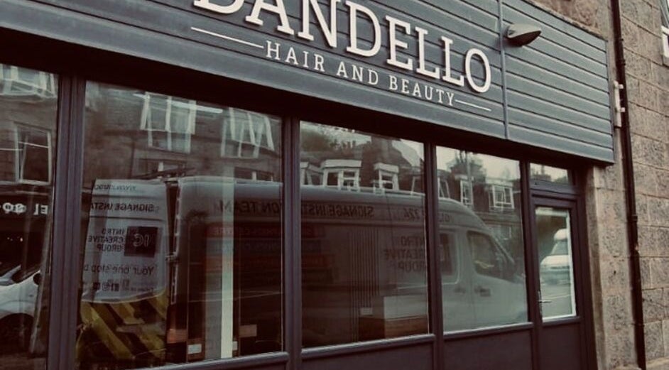 Nailsbyjessie venue exterior in Aberdeen, Scotland, GB with modern glass windows and stylish signage.