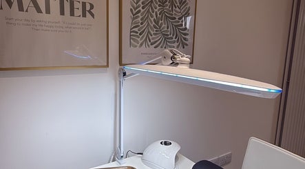 Elegant nail station at Nailsbyjessie in Aberdeen, Scotland, GB, showcasing modern decor and professional equipment.