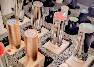 Collection of nail polish bottles at Garden Nail Haven in Chester, England, GB, offering vibrant color variety.