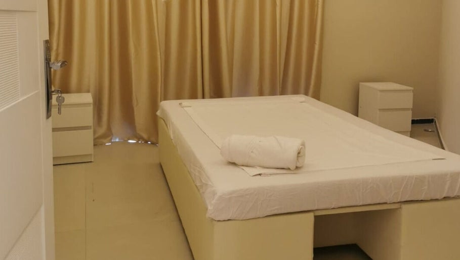 Calm treatment room with a bed at Third Eye Peace Spa, Dubai, AE.
