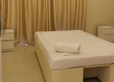 Calm treatment room with a bed at Third Eye Peace Spa, Dubai, AE.