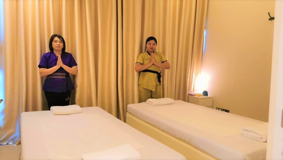 Tranquil massage room at Third Eye Peace Spa, Dubai, AE with therapists ready to welcome guests.