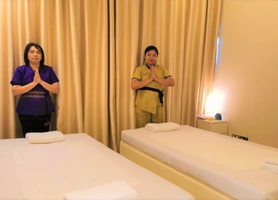 Tranquil massage room at Third Eye Peace Spa, Dubai, AE with therapists ready to welcome guests.