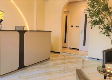 Elegant reception at Third Eye Peace Spa, Dubai, AE featuring modern decor and warm lighting.