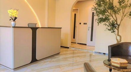 Elegant reception at Third Eye Peace Spa, Dubai, AE featuring modern decor and warm lighting.