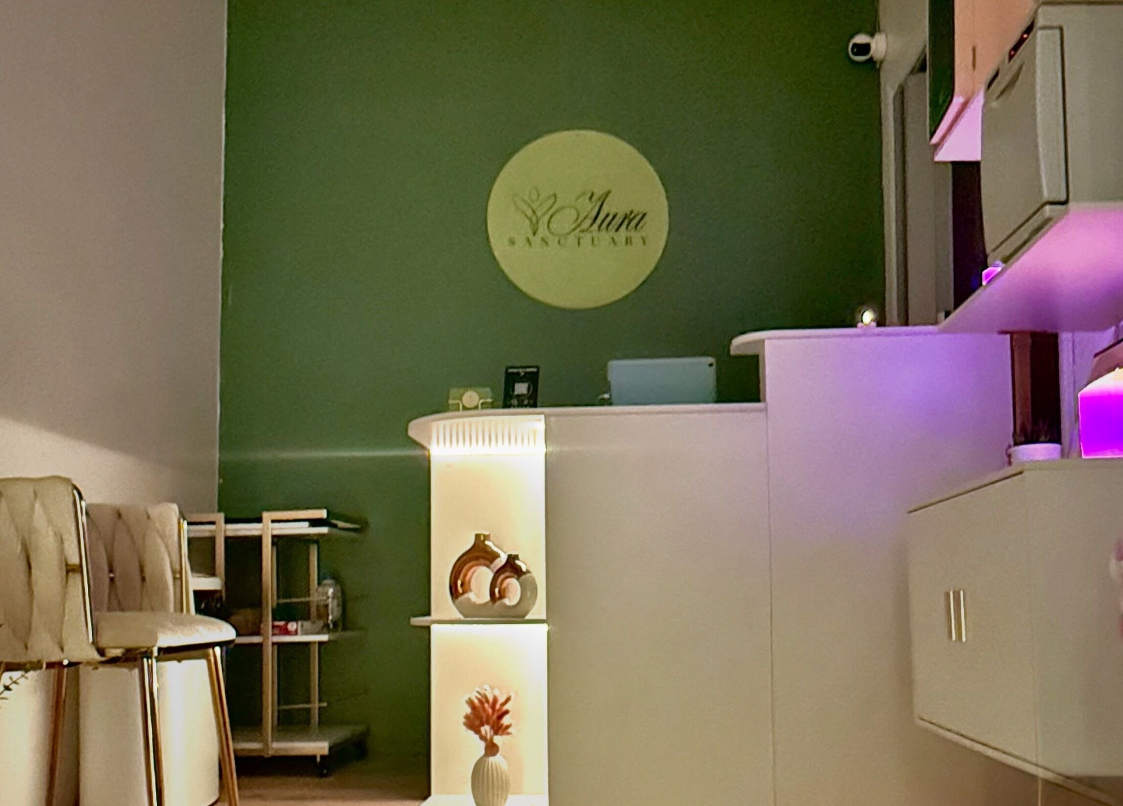 Reception area of Aura Sanctuary, New York, New York, US featuring elegant decor and soft lighting.