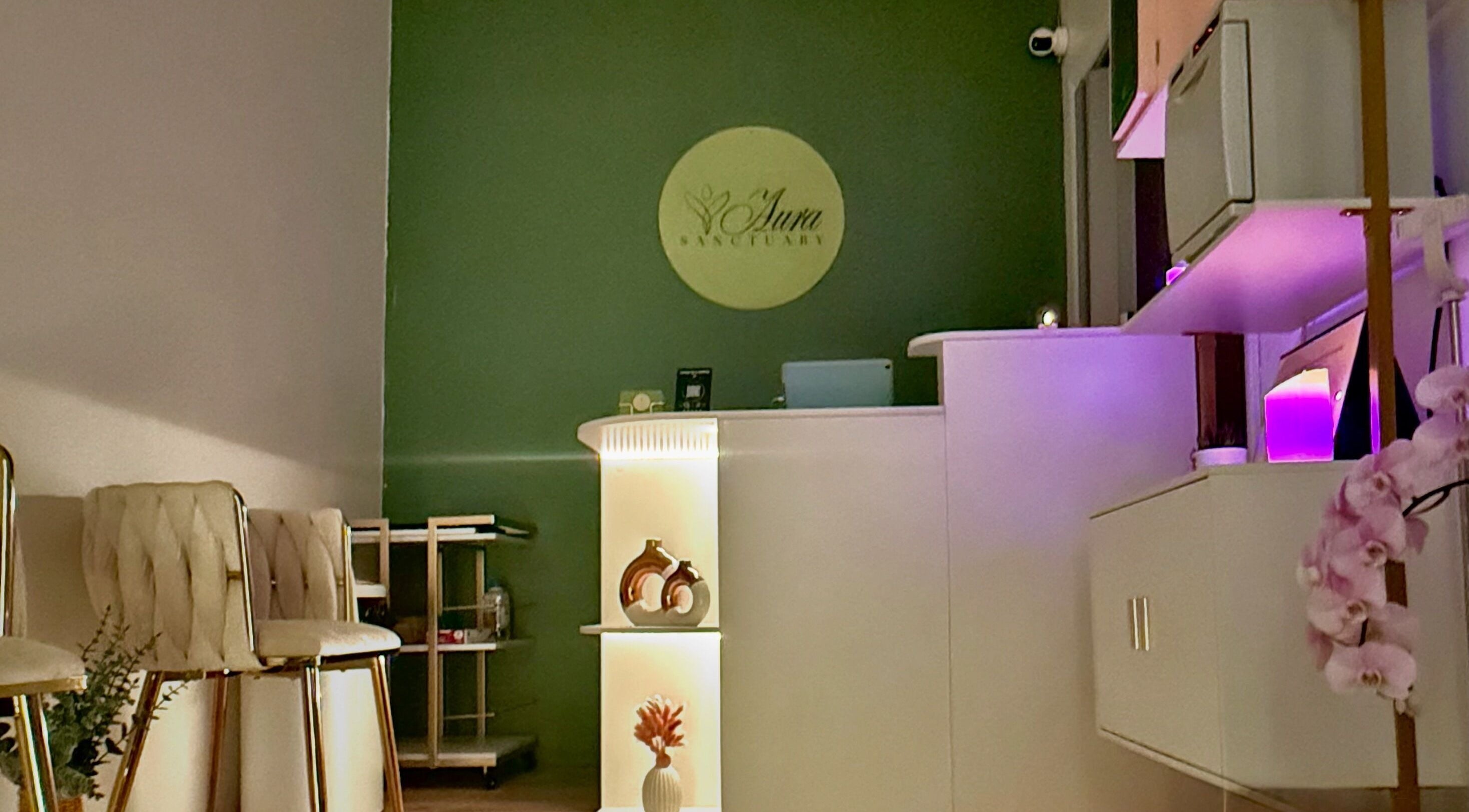 Reception area of Aura Sanctuary, New York, New York, US featuring elegant decor and soft lighting.