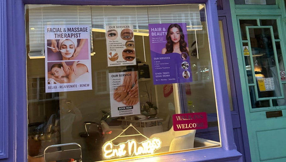 Blush Hair & Beauty window in London, England, GB showcases diverse beauty and wellness services.