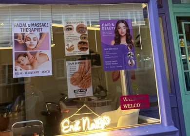 Blush Hair & Beauty window in London, England, GB showcases diverse beauty and wellness services.