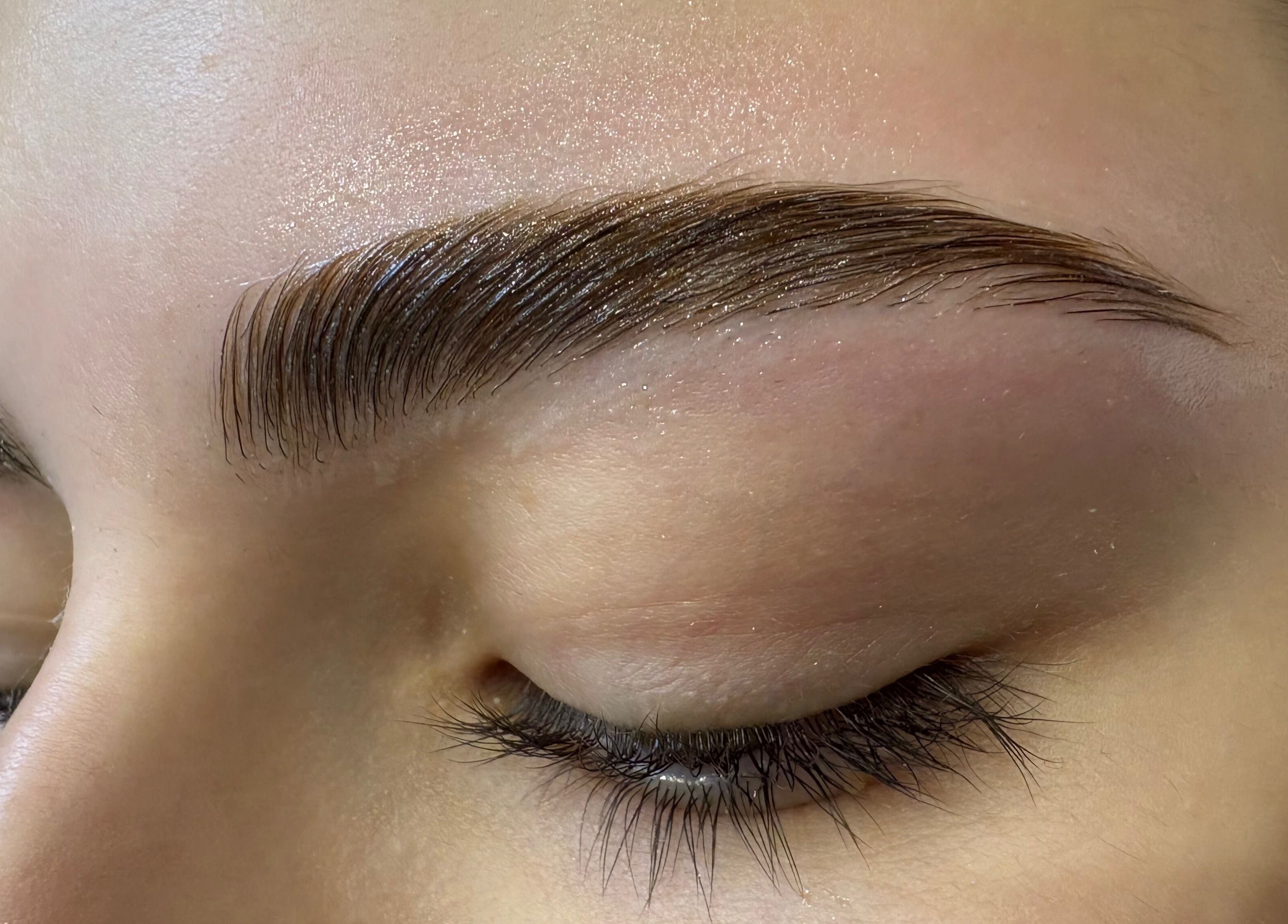 Close-up of perfectly shaped eyebrow at Blush Hair & Beauty, London, England, GB.