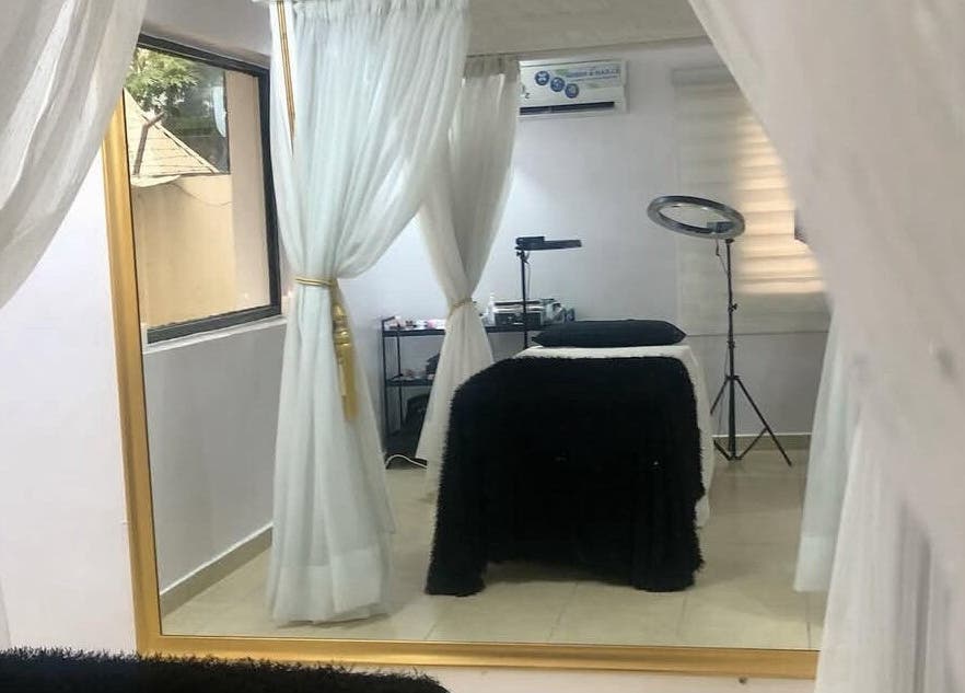 Elegant treatment room at Beauty Bottega, Lekki, Lagos, NG with cozy decor and ambient lighting.