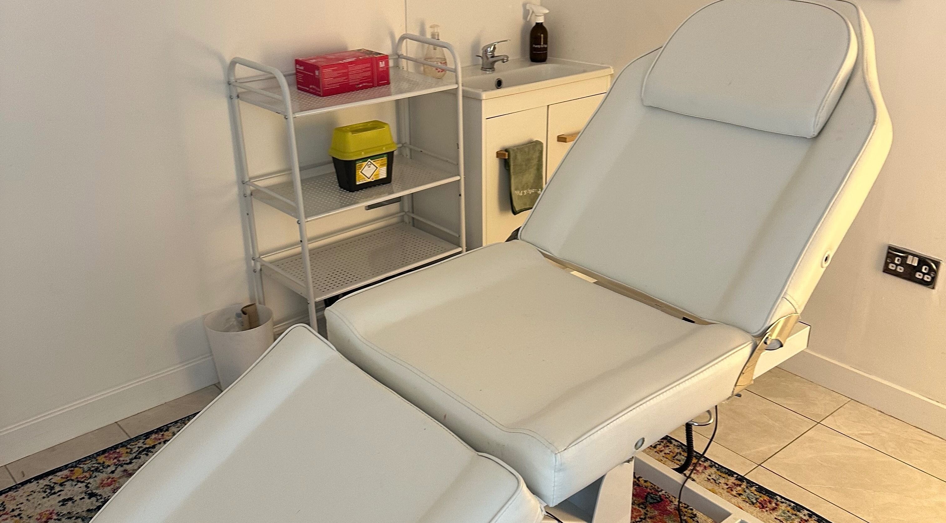 Relaxing treatment room with adjustable chair at Wellness Space @ The Clinic, Glasgow, Scotland, GB.
