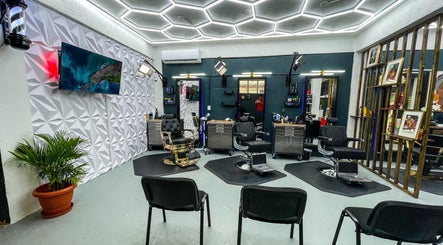Modern salon interior at Fresh Again Self Care Studio, The Valley, AI with stylish decor and seating.