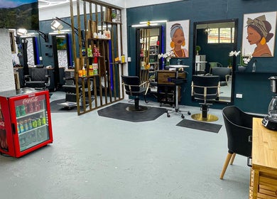 Fresh Again Self Care Studio in The Valley, AI offers a modern and welcoming interior with styling chairs and amenities.