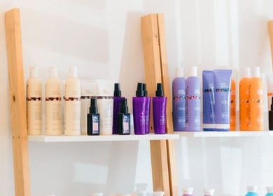 Shelves of premium hair products at Opalé Beauty Studio, Cape Town, Western Cape, ZA.