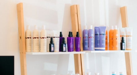 Shelves of premium hair products at Opalé Beauty Studio, Cape Town, Western Cape, ZA.