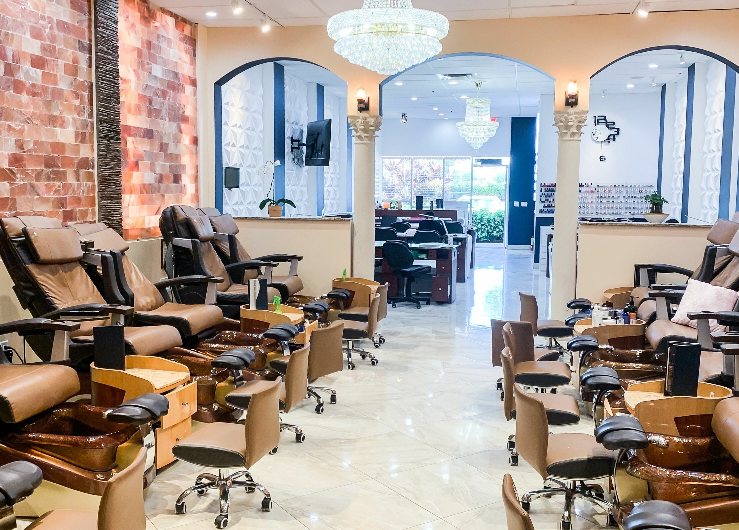 Luxurious pedicure chairs at Himalayan Nails and Spa in Royal Palm Beach, Florida, US offer a serene spa experience.