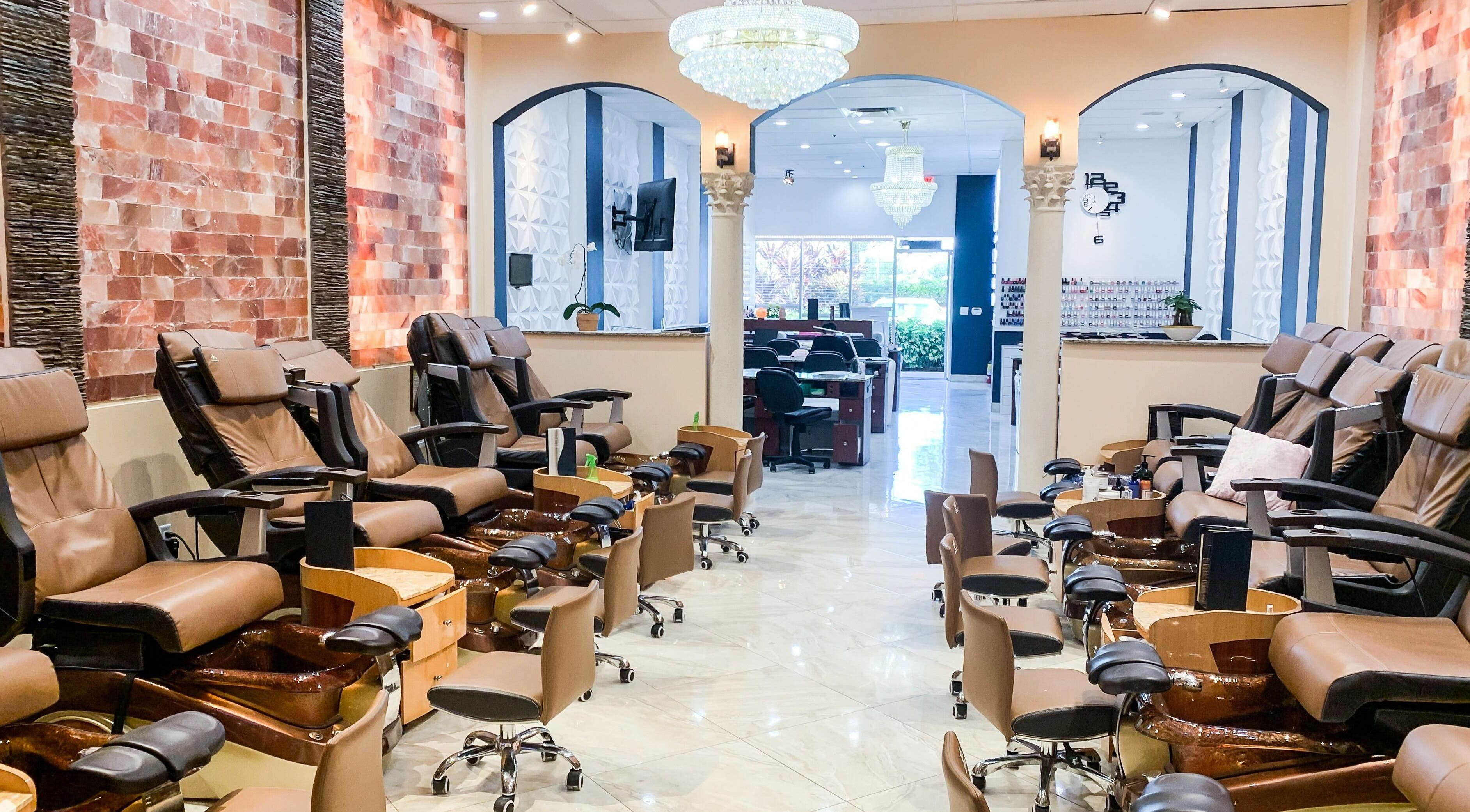 Luxurious pedicure chairs at Himalayan Nails and Spa in Royal Palm Beach, Florida, US offer a serene spa experience.