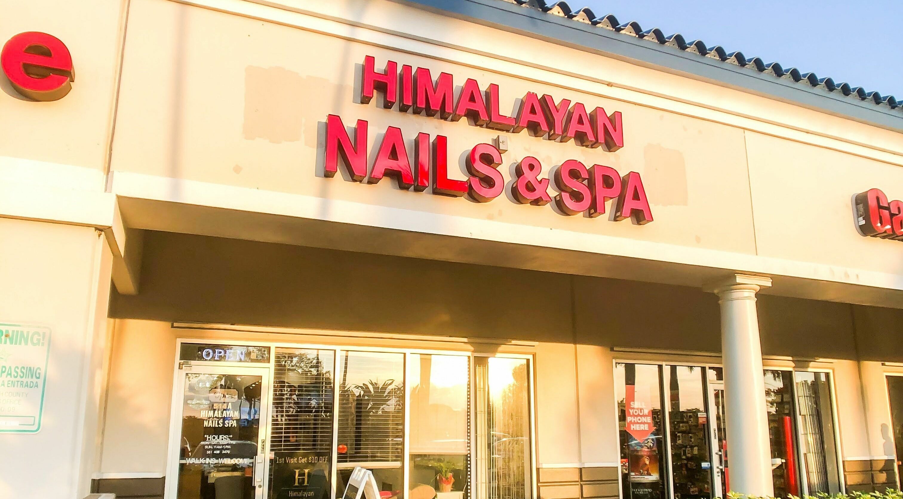 Front of Himalayan Nails and Spa at sunrise in Royal Palm Beach, Florida. Welcoming atmosphere and modern design.