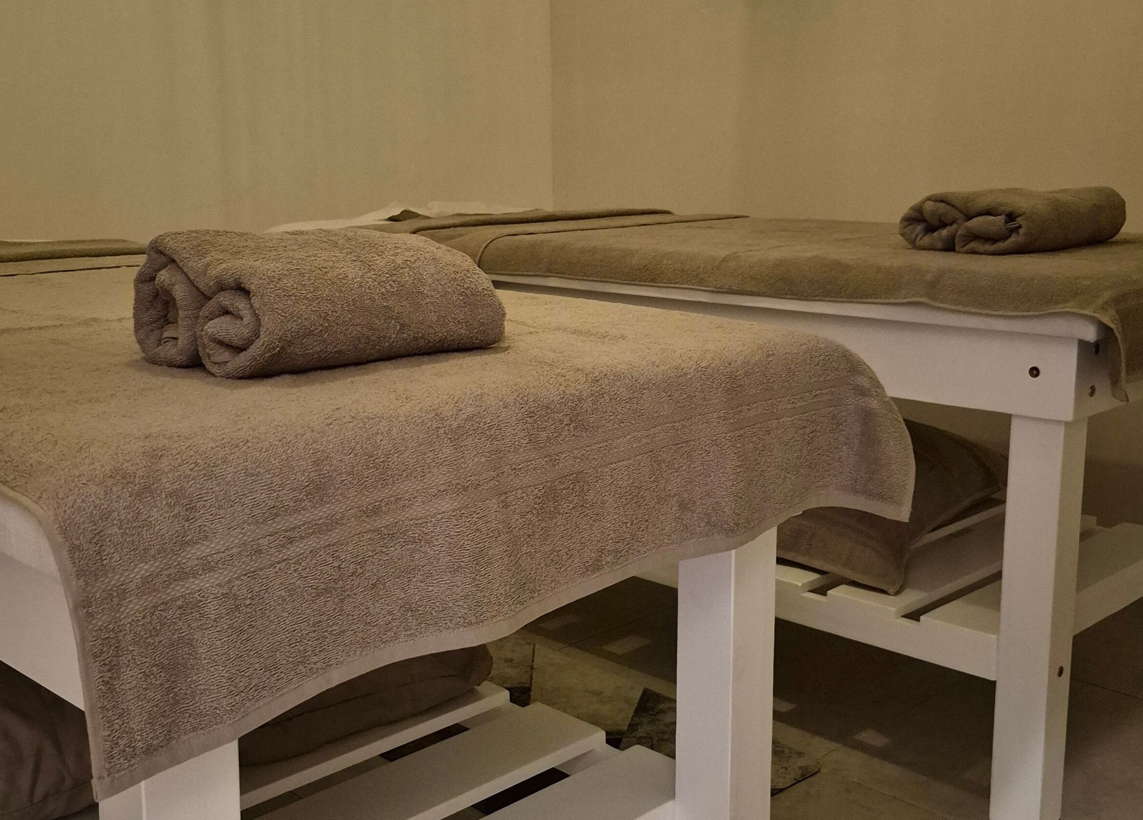 Cozy treatment beds at Quiet Vines Boutique Spa, Phoenix, Kwazulu-natal, ZA, offering serene relaxation.