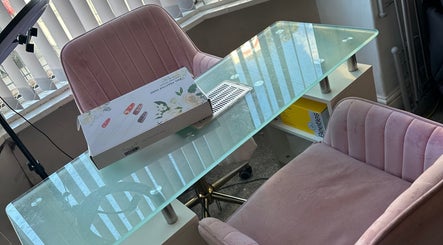 Elegant nail station with pink chairs at Chips Happen, Stainforth, England, GB.