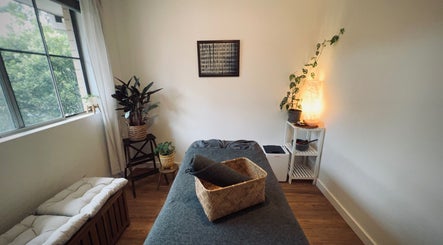 Cozy massage room with soft lighting at Ryan’s Relaxation Hub, Westmead, New South Wales, AU.