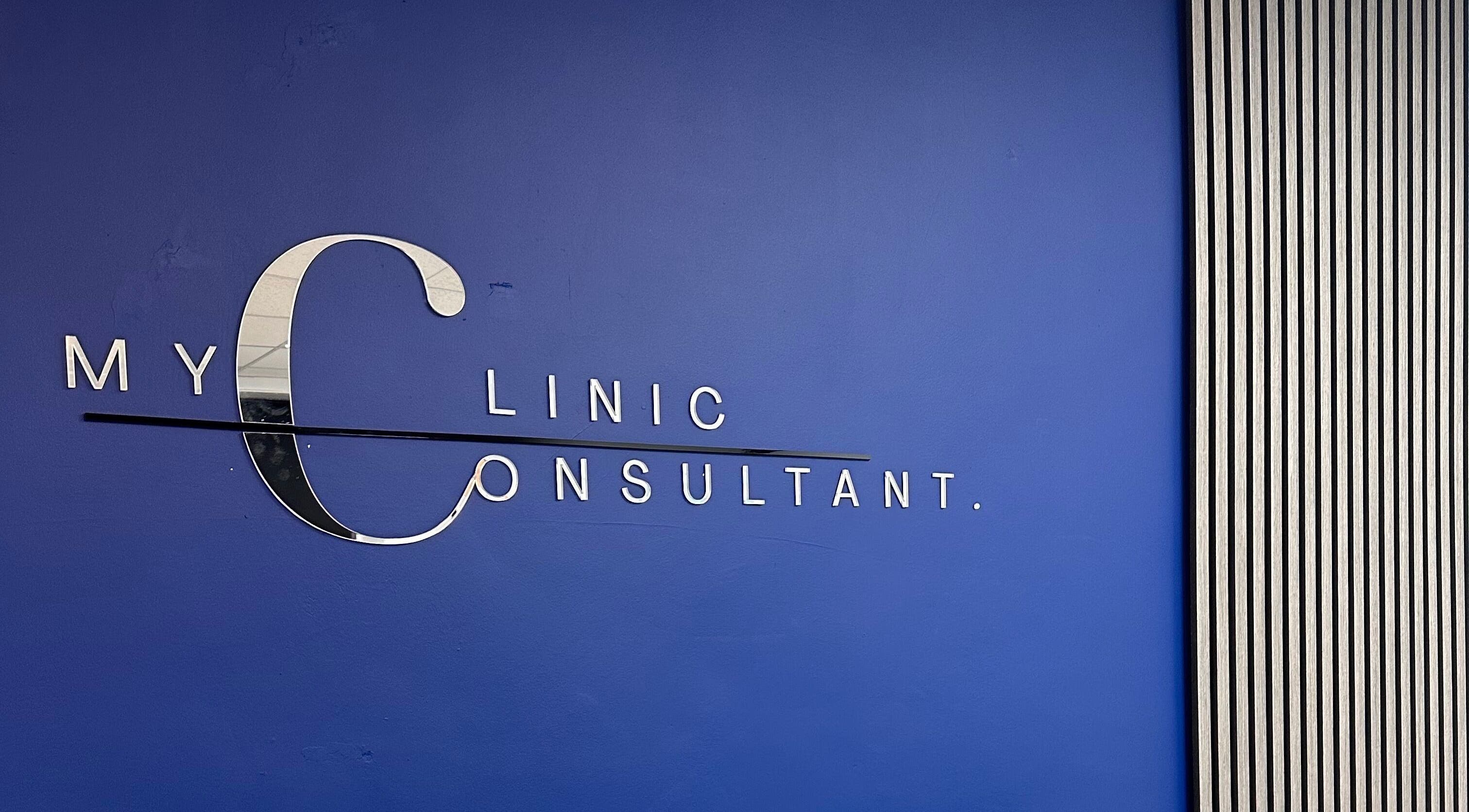 Blue wall with My Clinic Consultant signage in Chorley, England, GB.