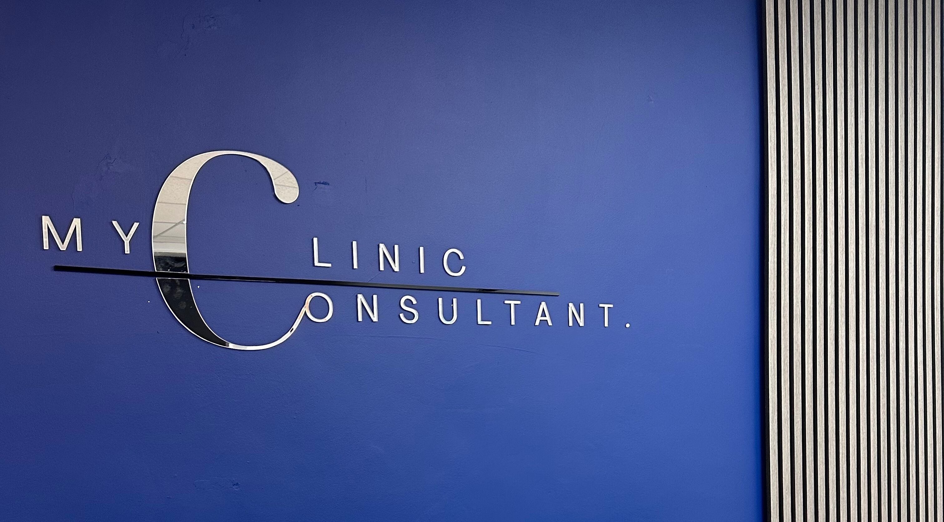 Blue wall with My Clinic Consultant signage in Chorley, England, GB.