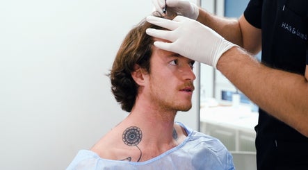 Hair treatment at Alowh, La Plata, Maryland, US. Client receiving expert care with precision.