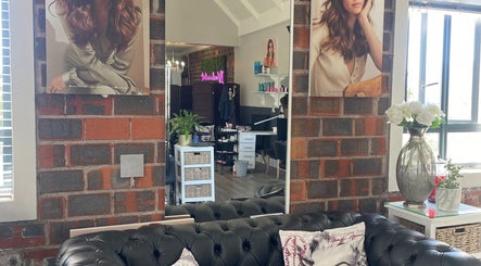 Stylish interior of Hair by Tess in Cape Town, Western Cape, ZA with elegant decor and comfortable seating.