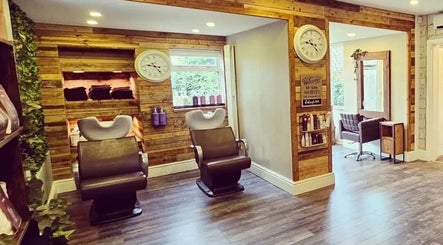 Warm, inviting salon chairs at Helow Beauty Blackpool, Blackpool, England, GB, showcasing its rustic decor.
