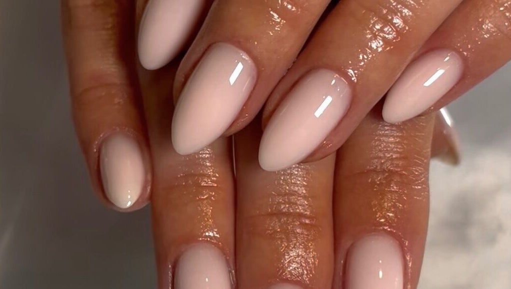Elegant natural nails at Nails by Ray, Chelmsford, England, GB with glossy finish.