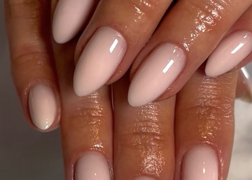 Elegant natural nails at Nails by Ray, Chelmsford, England, GB with glossy finish.