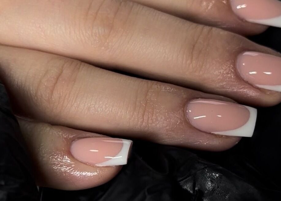Elegant French manicure by Nails by Ray, Chelmsford, England, GB. Perfectly shaped and glossy finish.