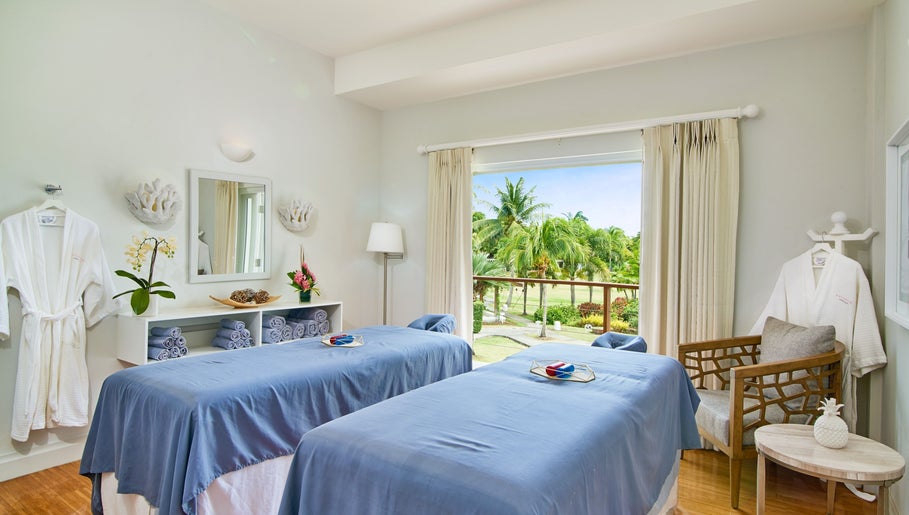 Soothing massage room at The Spa at Calabash with garden view in Saint George's, Saint George, GD.