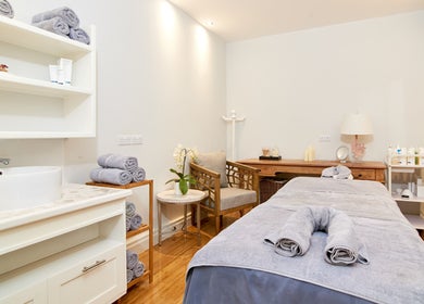 Relaxing treatment room at The Spa at Calabash, Saint George's, Saint George, GD, featuring a cozy massage table.