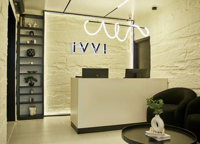 Modern reception area at IVVI, Lekki, Lagos, NG. Elegant decor with warm lighting.