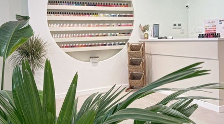 Bright and modern waiting area with lush plants at REE SPA, New York, New York, US.