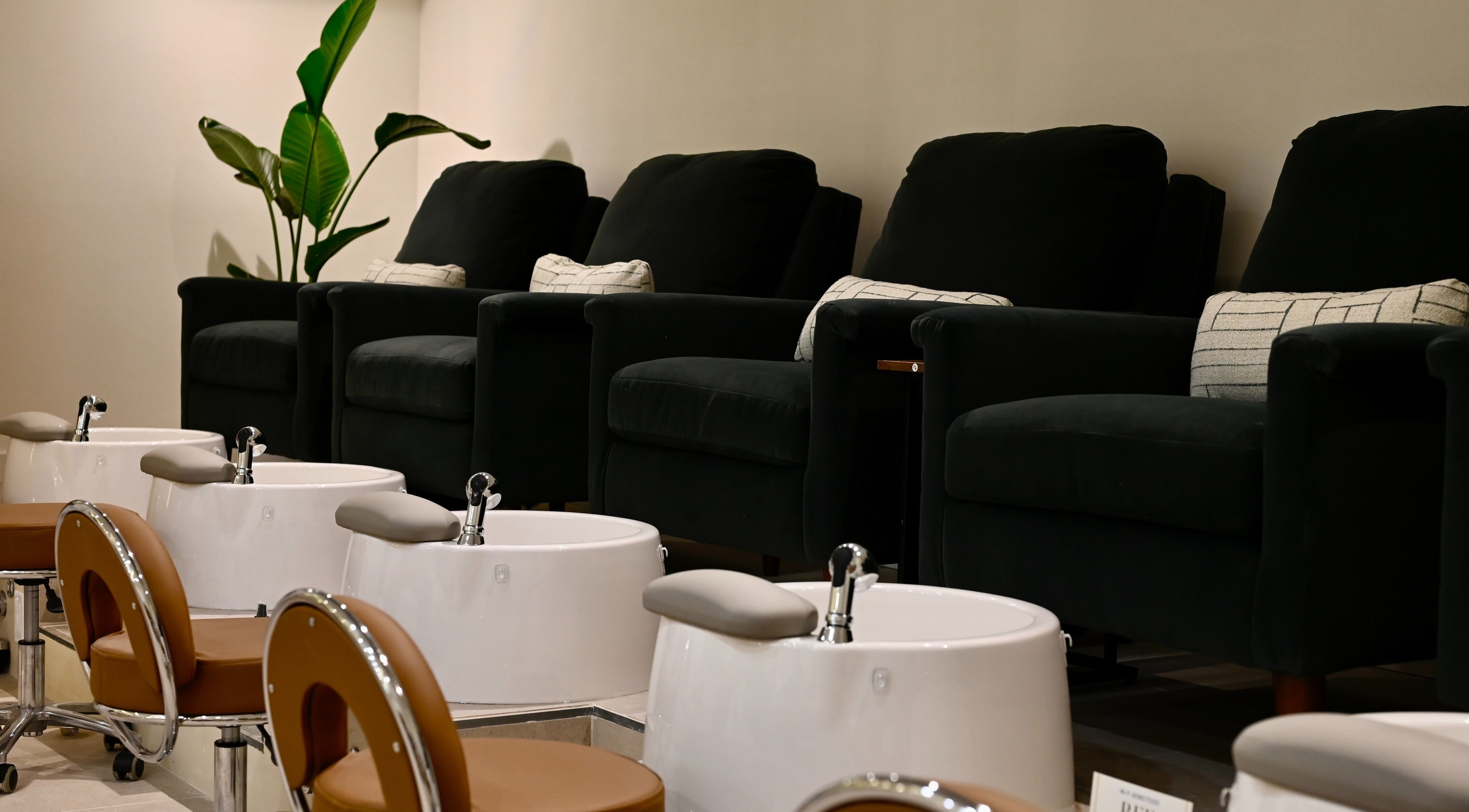 Luxurious pedicure stations at REE SPA, New York, New York, US, offering a serene wellness experience.