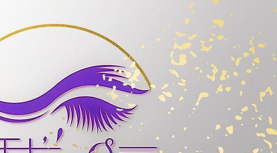 Stylized purple lash logo of Tati's Lash & Beauty at Church View, Saint John, BB with gold accents.