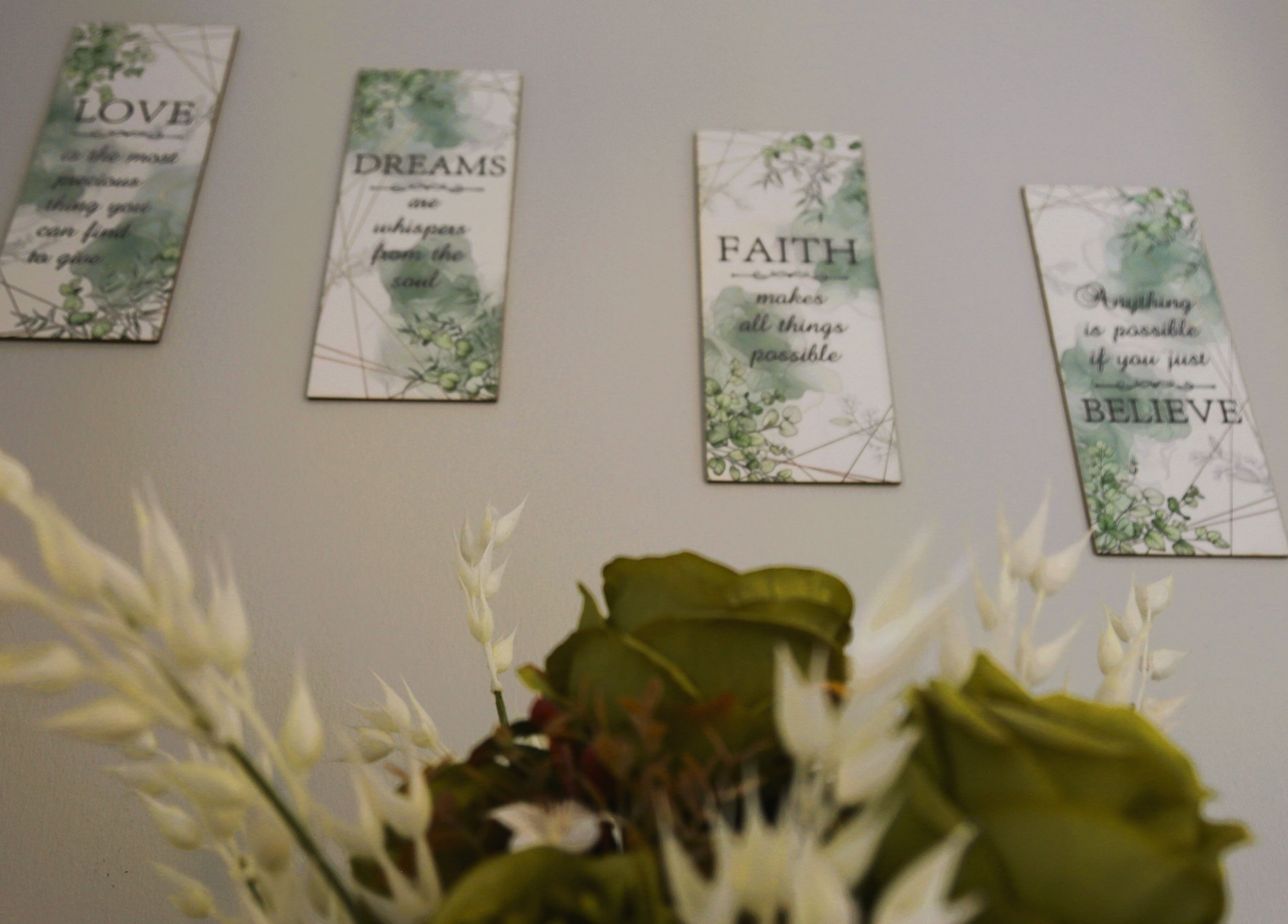 Decorative wall art at OCD Permanent MakeUp, Krugersdorp, Gauteng, ZA, featuring motivational quotes.