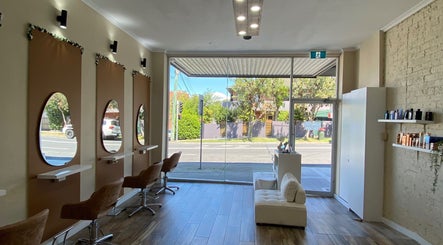 Chic interior of Hairbyloisbodie, Randwick, New South Wales, AU, featuring stylish salon chairs and mirrors.